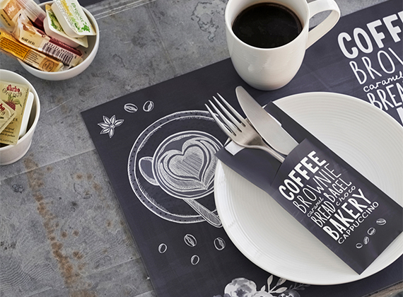 Matching branded napkin pocket and placemat in a cafe